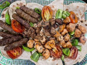 Mashawi is a combinations of shish tawook, kafta, and lahem meshwi