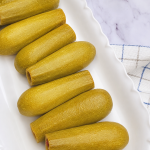 Koussa b Lahme - Zucchini Spiced Meat and Rice Baked in Grape Leaves Tangy Sauce
